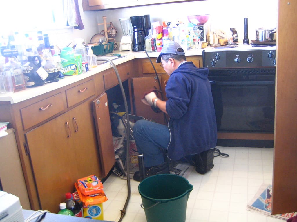 Residential plumbing fixtures and pipe service work